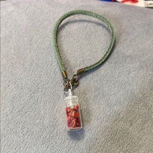 Green Cord Necklace with Red Bead Pendant